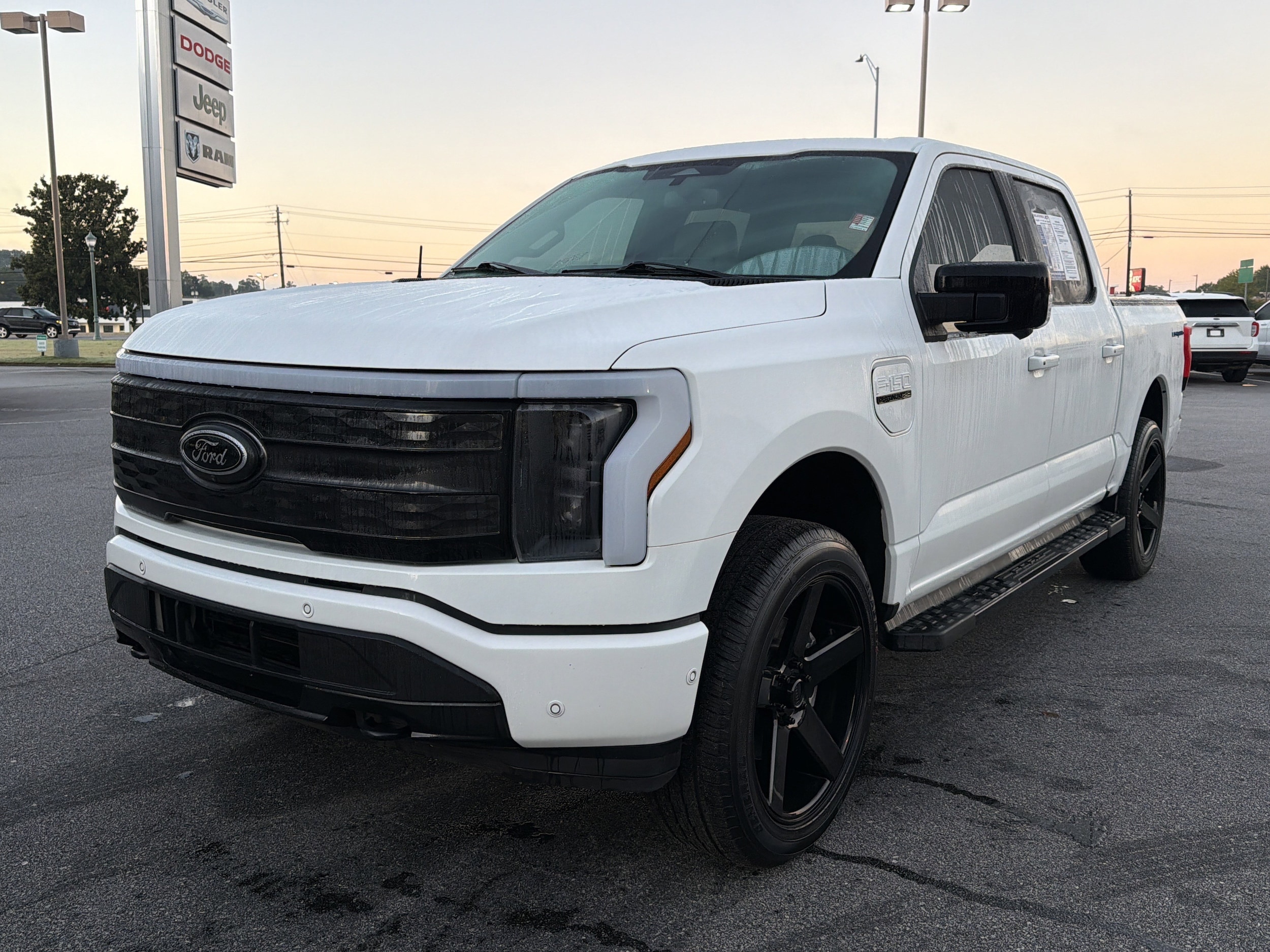 Used 2022 Ford F-150 Lightning Platinum with VIN 1FT6W1EVXNWG03240 for sale in Buford, GA