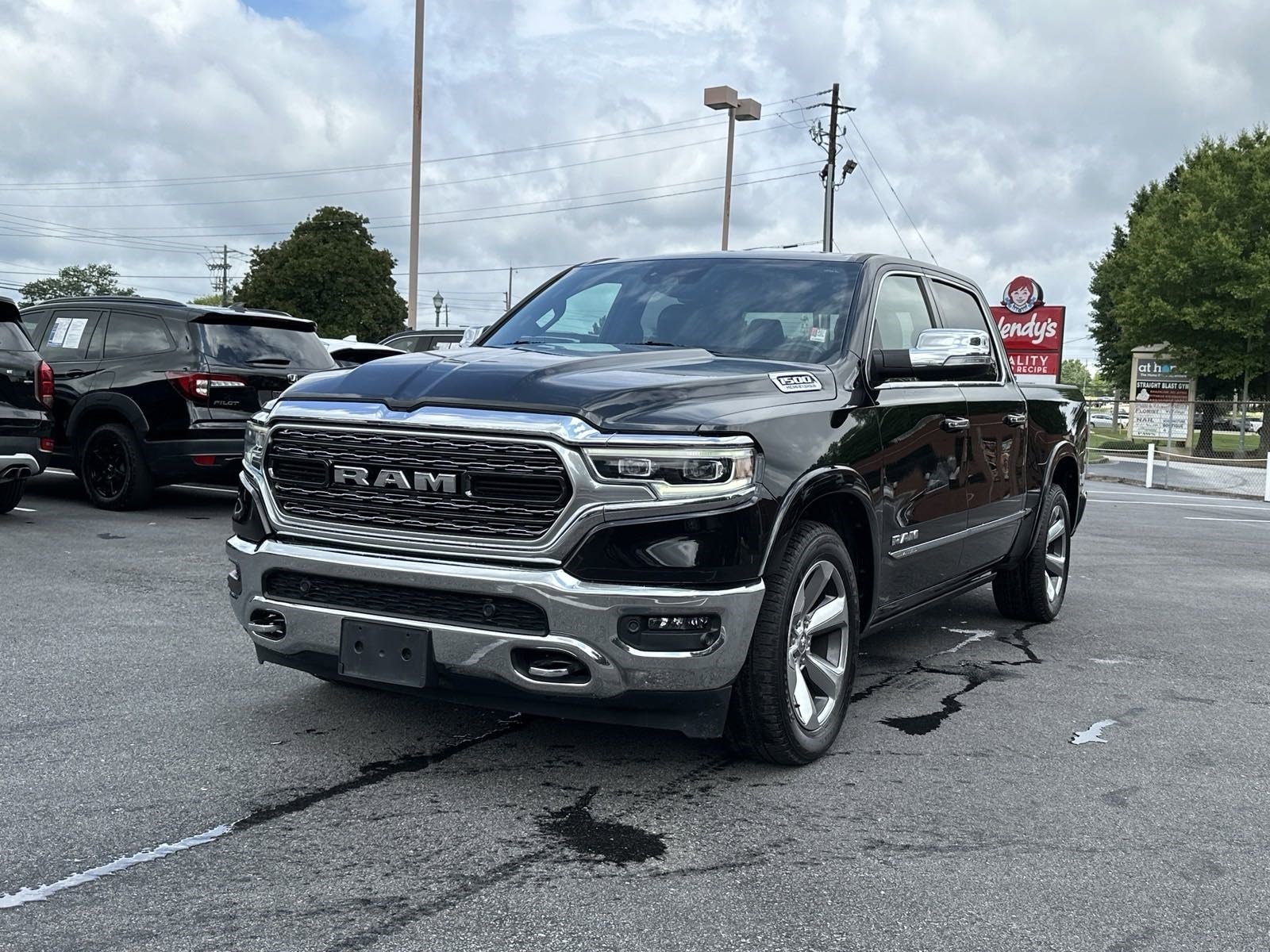 Used 2022 RAM Ram 1500 Pickup Limited with VIN 1C6SRFHT1NN248422 for sale in Buford, GA