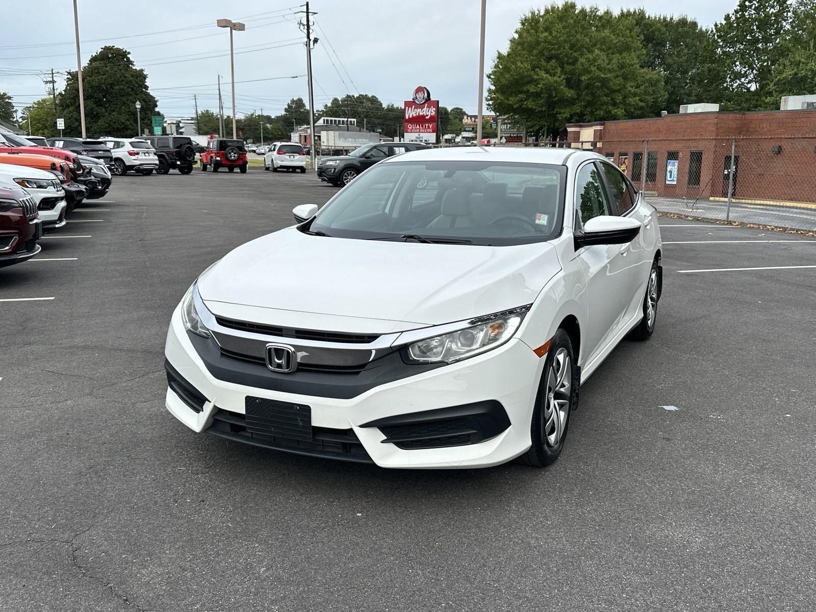 Used 2018 Honda Civic LX with VIN 19XFC2E58JE040305 for sale in Buford, GA