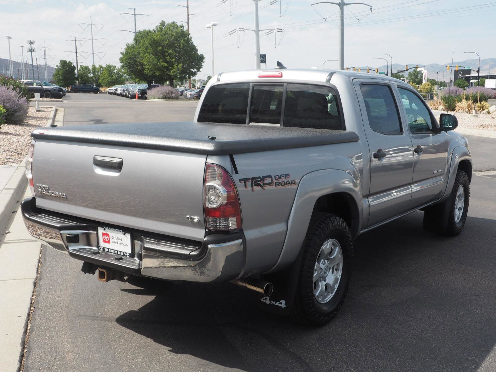 Used 2015 Toyota Tacoma Base with VIN 3TMLU4ENXFM197486 for sale in Draper, UT