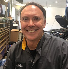 Staff member John Daly from 3c5a8711a7ec