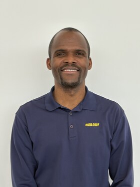Staff member Jean Delia from 145538577dd7