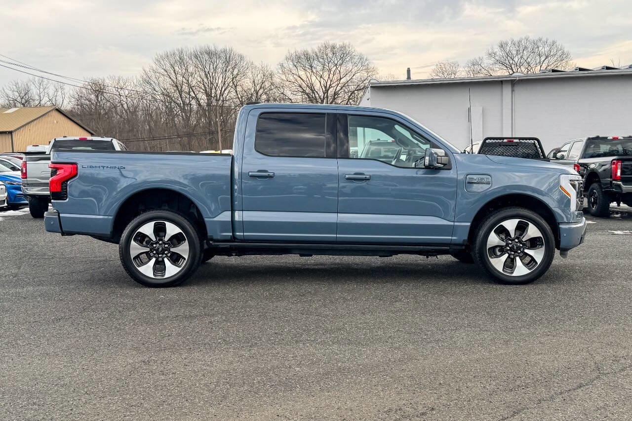 Used 2023 Ford F-150 Lightning Platinum with VIN 1FT6W1EVXPWG16315 for sale in Mechanicville, NY