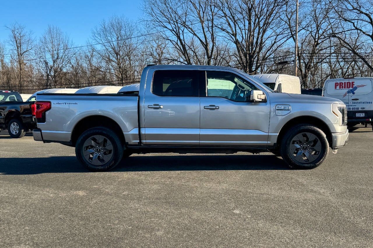 Used 2023 Ford F-150 Lightning Lariat with VIN 1FT6W1EV6PWG51692 for sale in Mechanicville, NY