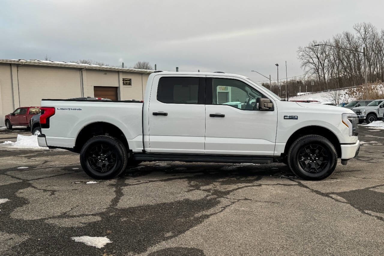 Used 2025 Ford F-150 Lightning XLT with VIN 1FTVW3LK6SWG24386 for sale in Mechanicville, NY