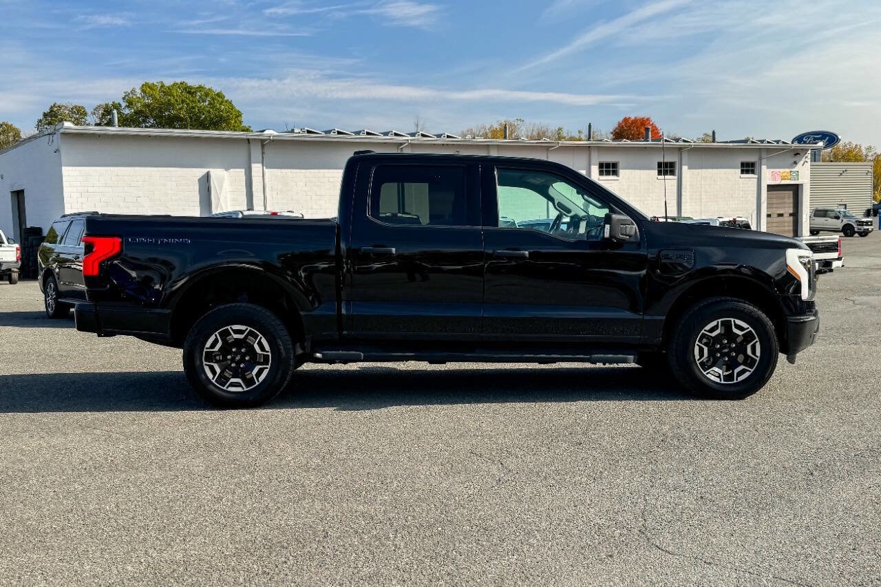 Used 2023 Ford F-150 Lightning XLT with VIN 1FTVW1ELXPWG00108 for sale in Mechanicville, NY
