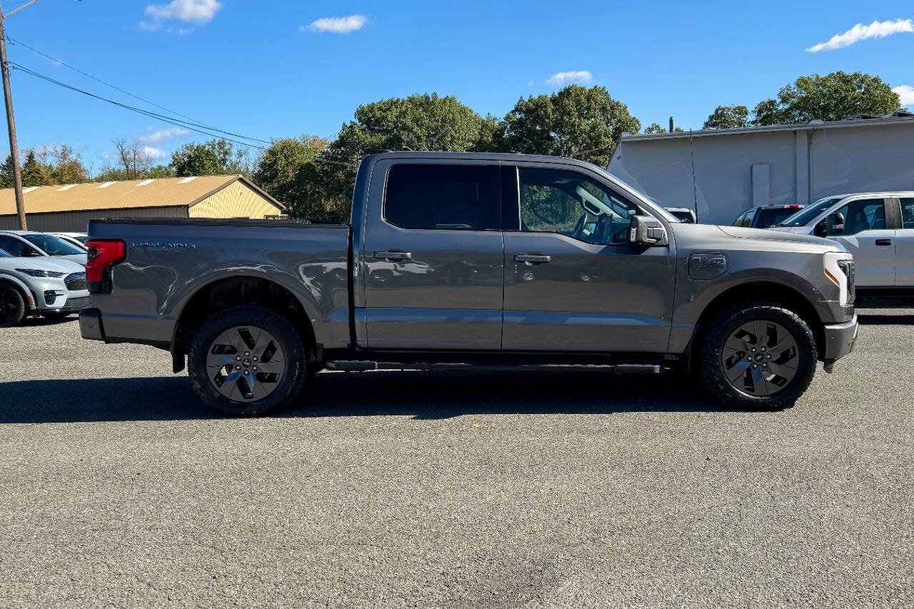 Used 2023 Ford F-150 Lightning Lariat with VIN 1FTVW1EV8PWG09942 for sale in Mechanicville, NY