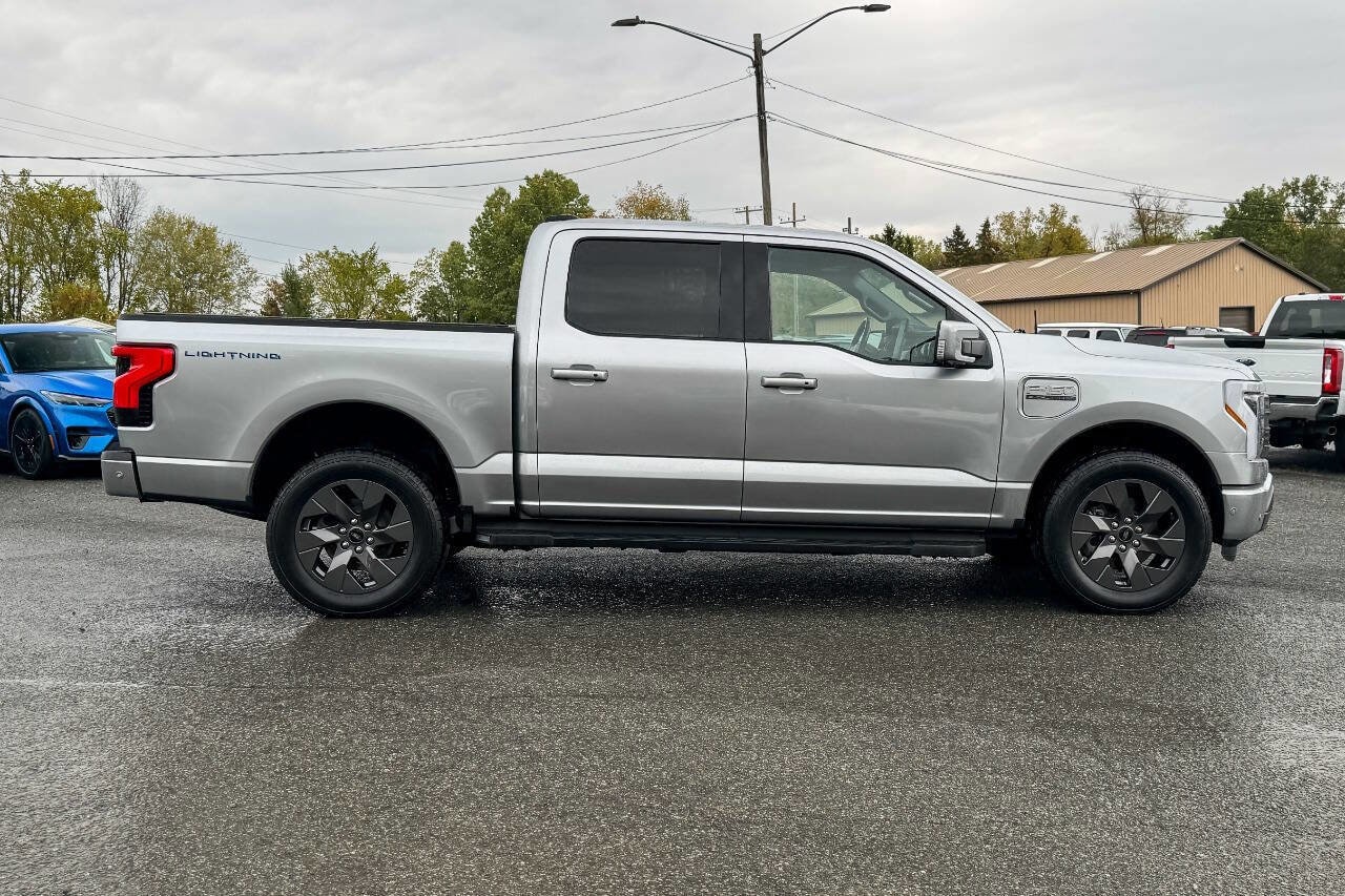 Used 2022 Ford F-150 Lightning Lariat with VIN 1FT6W1EV4NWG01029 for sale in Mechanicville, NY