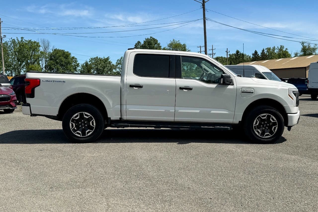 Used 2023 Ford F-150 Lightning XLT with VIN 1FT6W1EV5PWG02922 for sale in Mechanicville, NY