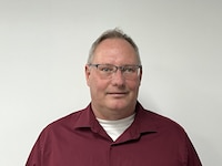 Staff member Ron Schmerbeck from ID_30945ea894bc