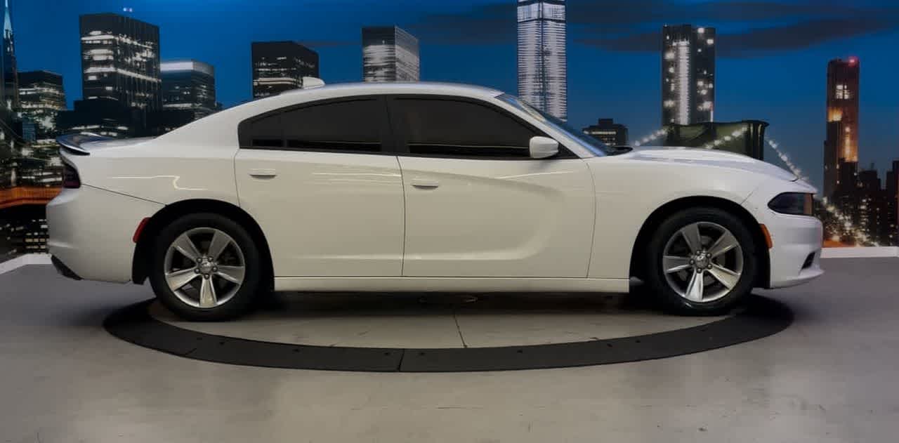 Used 2016 Dodge Charger SXT with VIN 2C3CDXHG1GH266004 for sale in New York, NY