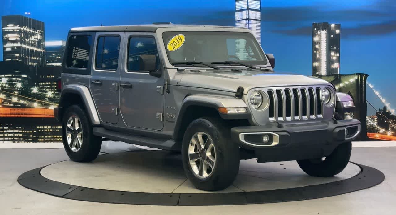 Used 2019 Jeep Wrangler Unlimited Sahara with VIN 1C4HJXEN0KW501810 for sale in New York, NY