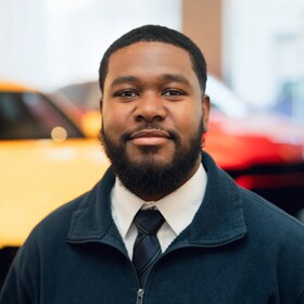 Staff member Rhas J. Augustin from ID_147f8b