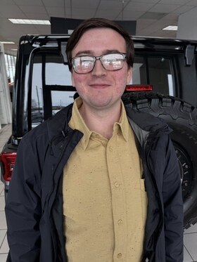 Staff member Garrett Abney from 5f27d29a7242