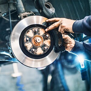 Hands Working on Brakes