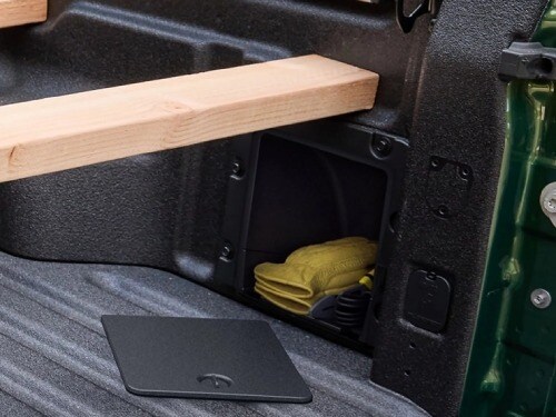 2025 Ford Maverick close up view of in-bed cubby storage