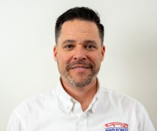 Staff member Graham Kirby  from ID_389247
