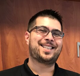 Staff member John Davis from ID_389247