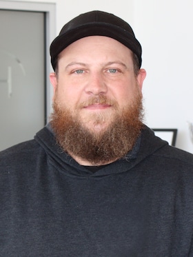 Staff member Andrew Miller from 3e8cea1e519e