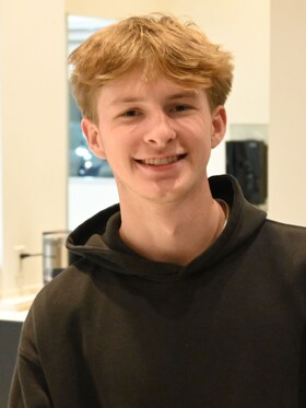 Staff member Adam Bell from 15b7e96354ab