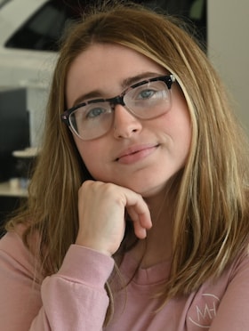 Staff member Anna Omarrah from 07552c95ff03