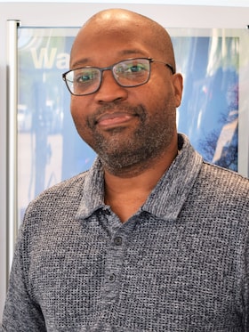 Staff member Cedric Russell from 10bd0e55e38e