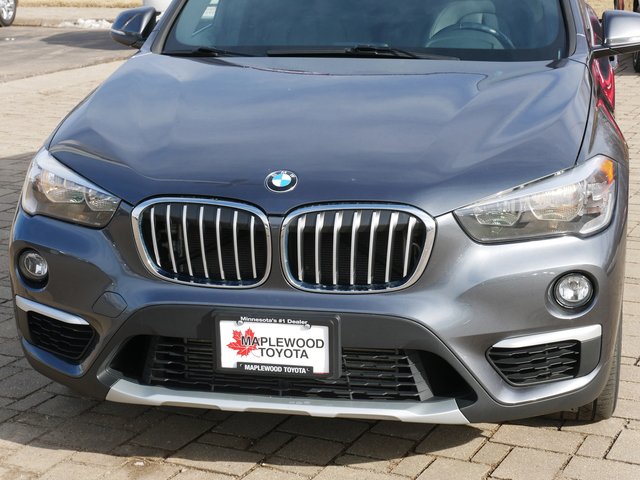 Used 2018 BMW X1 28i with VIN WBXHT3C32J5L26083 for sale in Maplewood, Minnesota