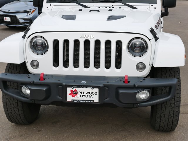 Used 2016 Jeep Wrangler Unlimited Rubicon with VIN 1C4HJWFG0GL335971 for sale in Maplewood, Minnesota