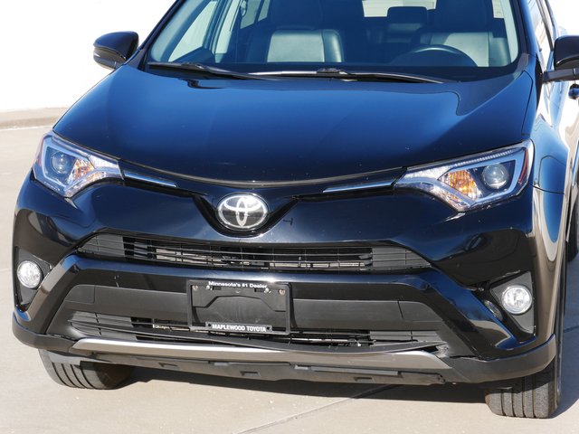 Used 2017 Toyota RAV4 XLE with VIN 2T3RFREV8HW592270 for sale in Maplewood, Minnesota