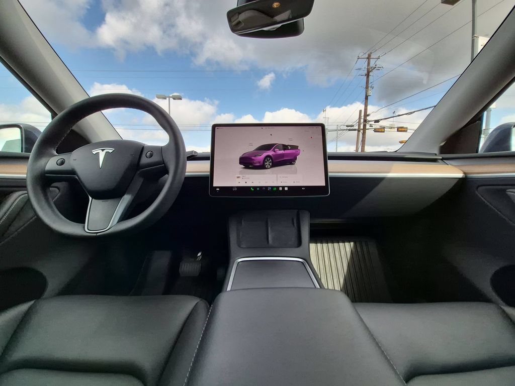 Used 2024 Tesla Model Y Long Range with VIN 7SAYGDEE6RA279611 for sale in Marble Falls, TX