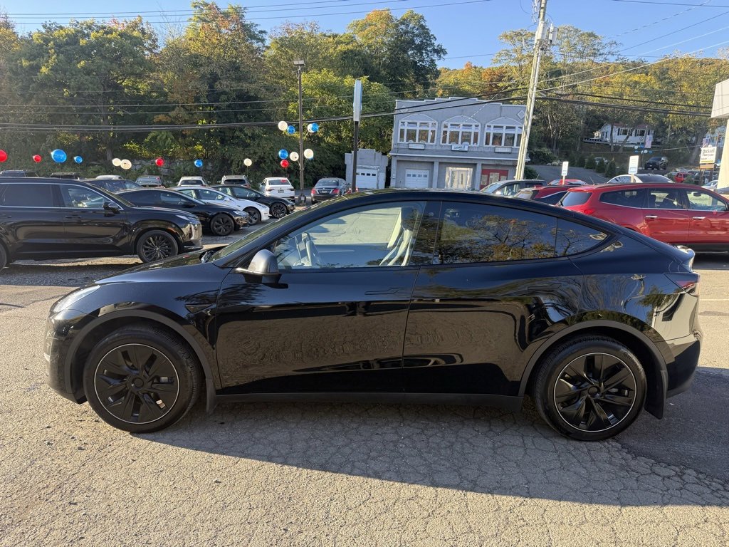 Used 2023 Tesla Model Y Long Range with VIN 7SAYGDEE9PA108896 for sale in Kansas City