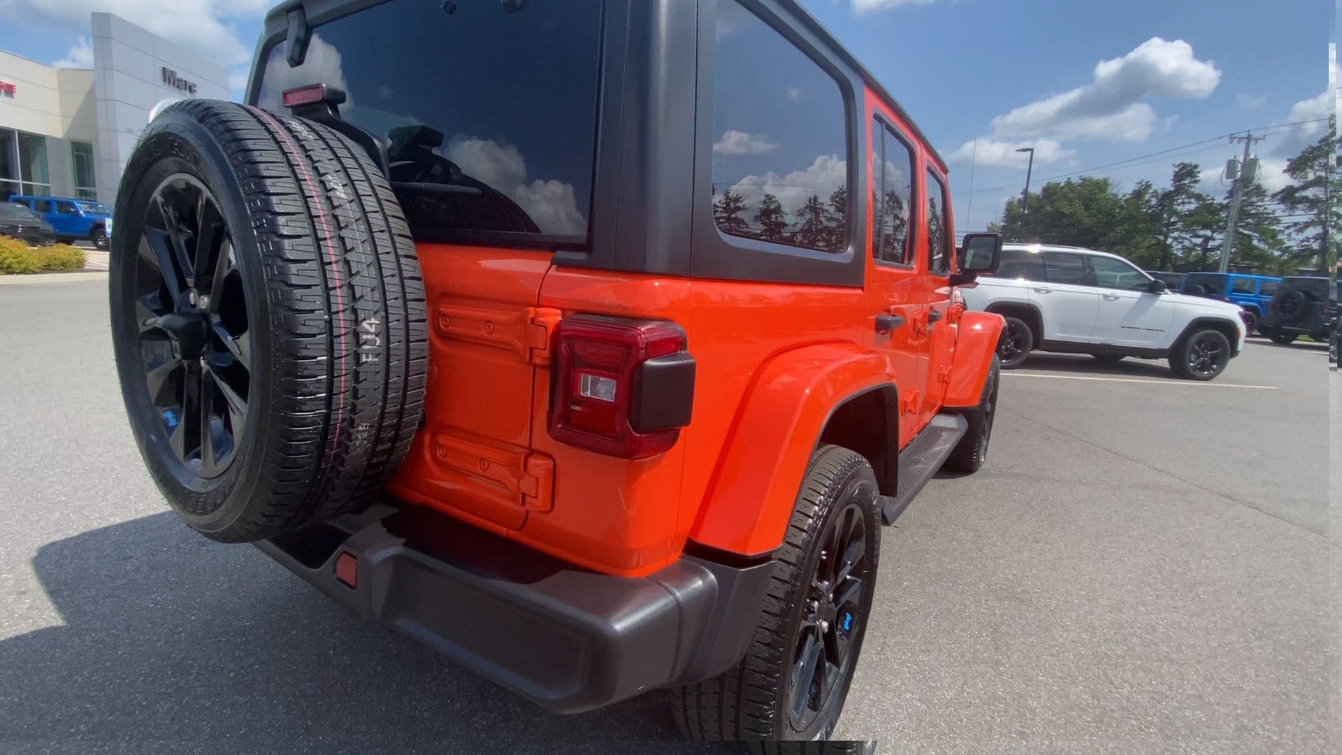 Used 2023 Jeep Wrangler 4xe Sahara 4XE with VIN 1C4JJXP68PW652554 for sale in Sanford, ME