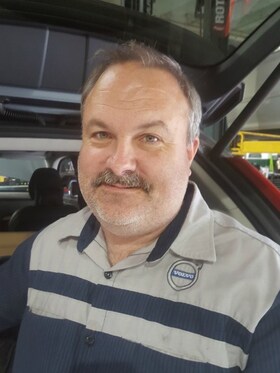 Staff member Alex Burnell from 518ac10189ee