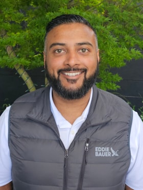 Staff member Justin Prasad from ID_40f8463b41cd