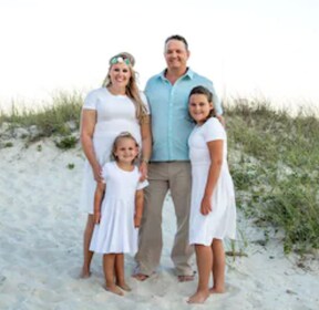 Staff member Travis Hill from 5705df97196b