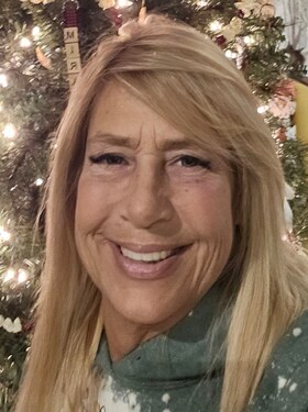 Staff member Cyndi Stewart from d0f10b6475b7