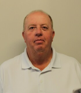 Staff member Aaron Fisher from 714dbdea924c