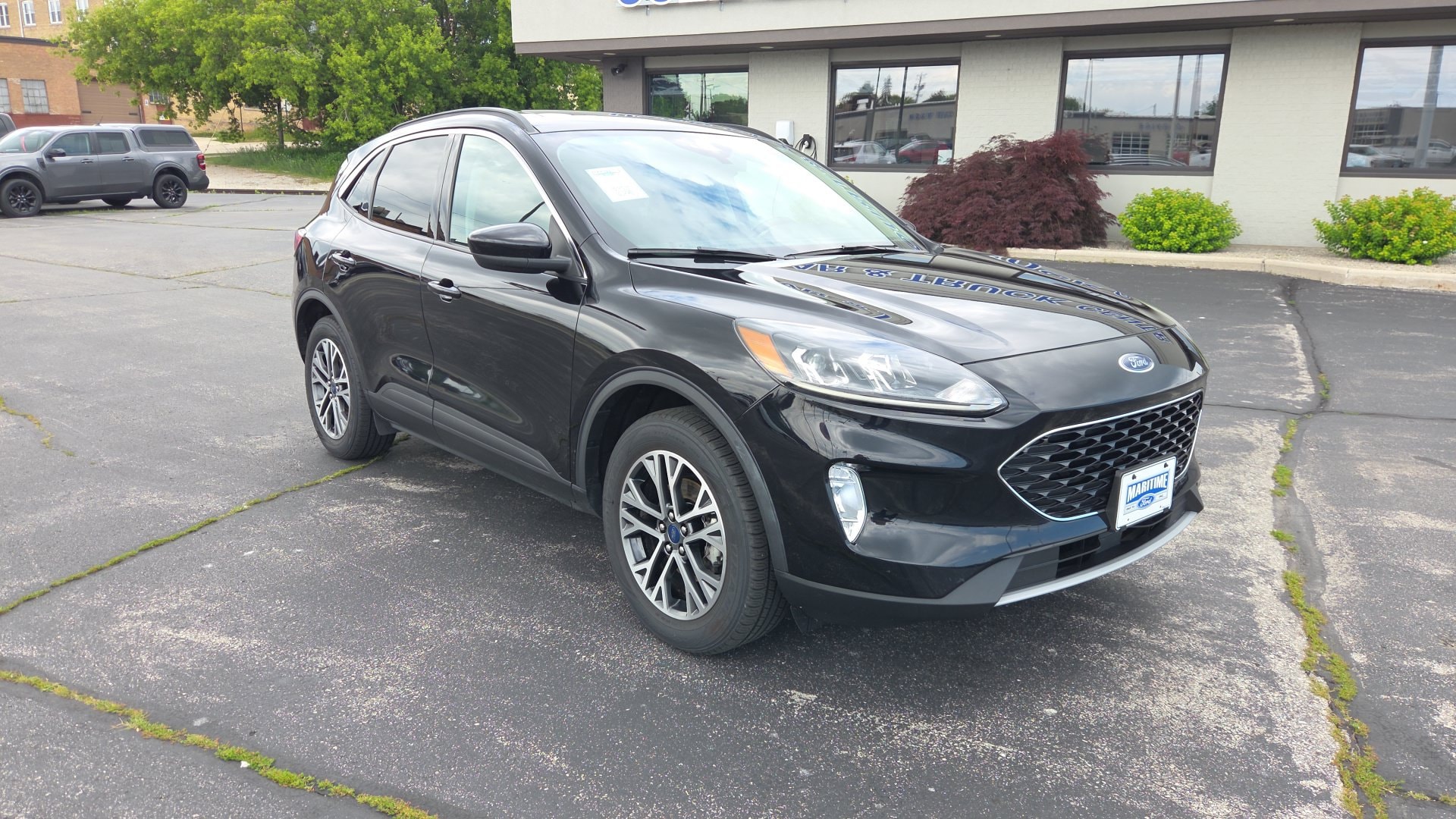 Used 2020 Ford Escape SEL with VIN 1FMCU9H60LUA49271 for sale in Manitowoc, WI