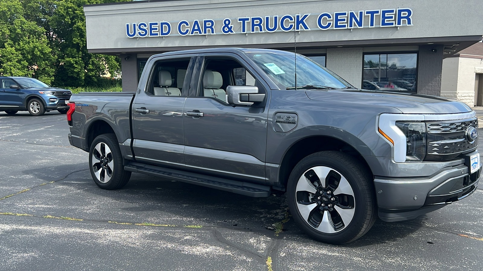 Used 2023 Ford F-150 Lightning Platinum with VIN 1FT6W1EV8PWG45876 for sale in Manitowoc, WI
