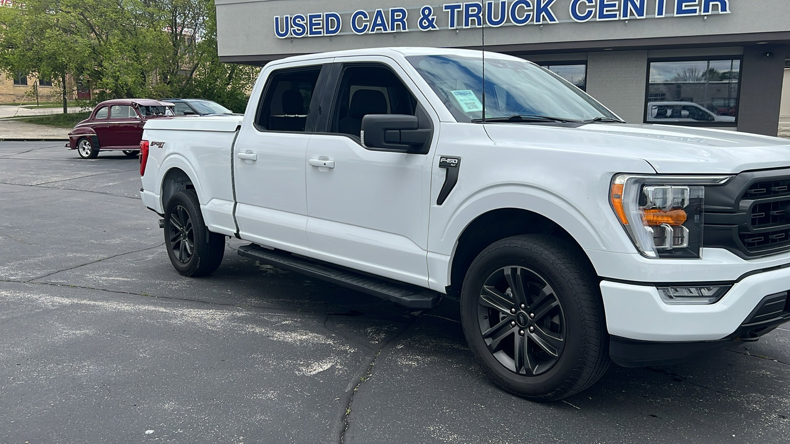 Used 2021 Ford F-150 XLT with VIN 1FTFW1E59MFC53534 for sale in Manitowoc, WI