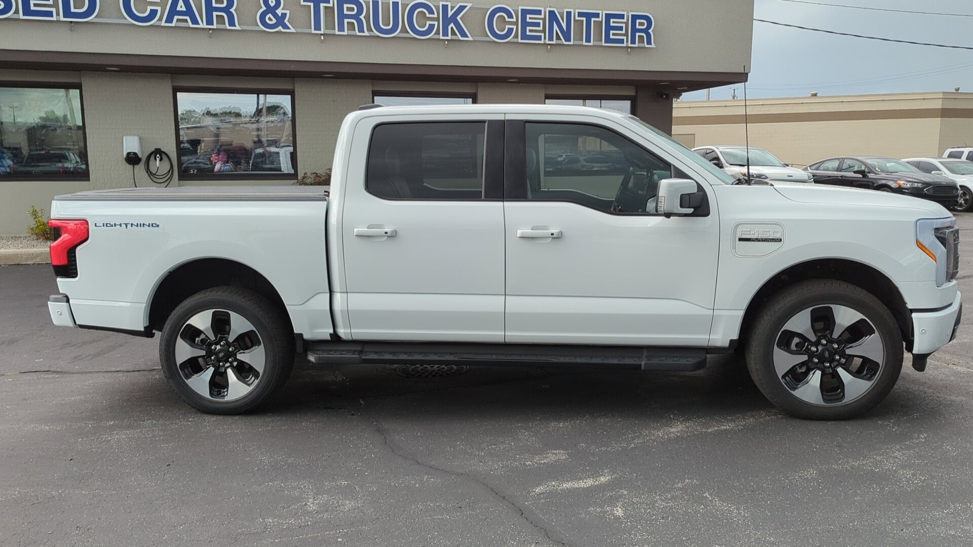 Used 2022 Ford F-150 Lightning Platinum with VIN 1FT6W1EV1NWG03126 for sale in Manitowoc, WI