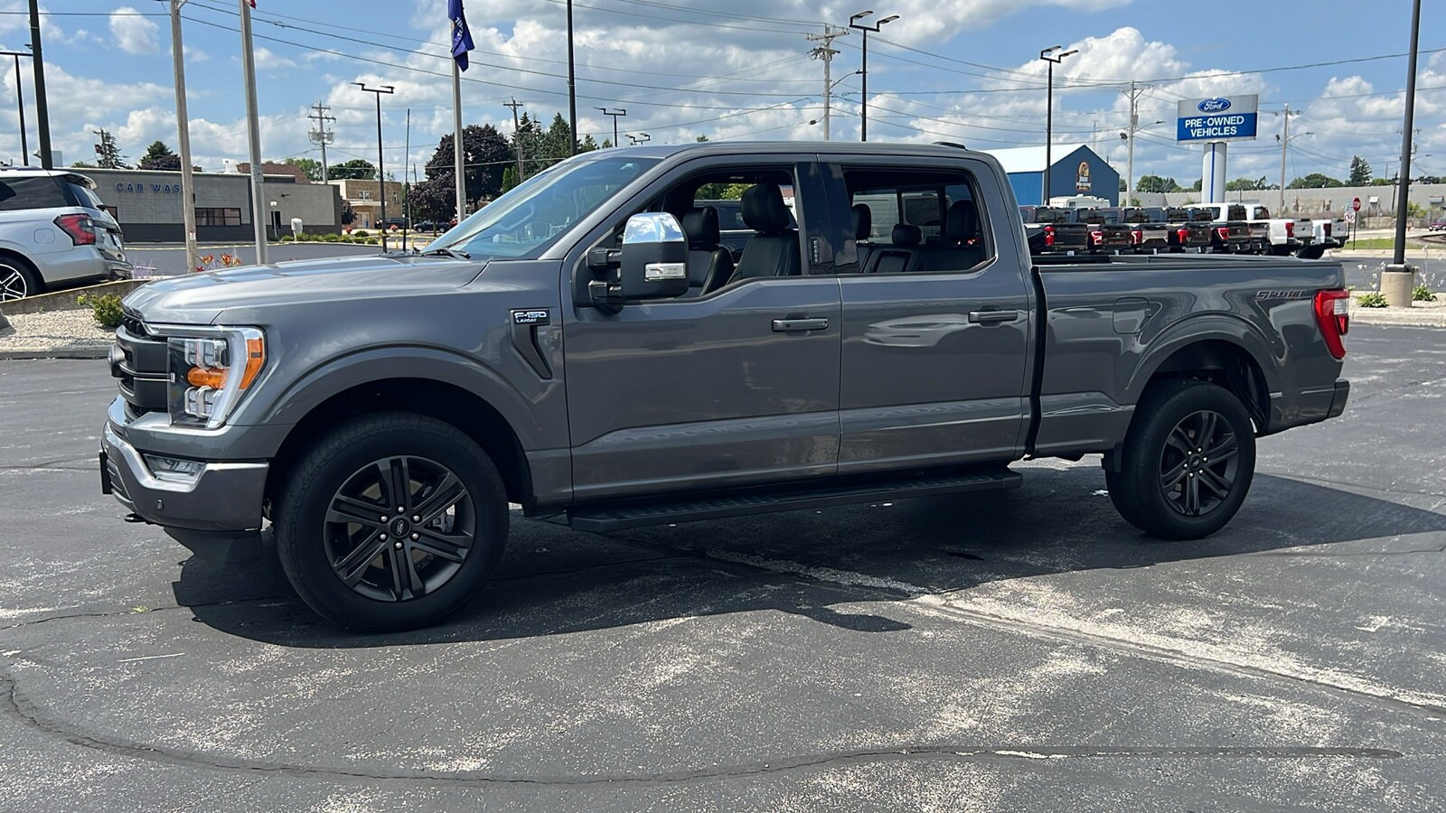 Certified 2021 Ford F-150 Lariat with VIN 1FTFW1E51MKE11260 for sale in Manitowoc, WI