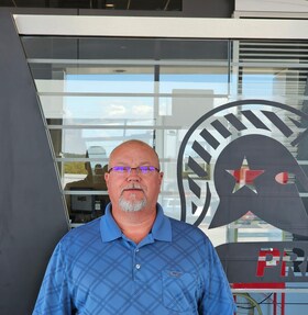 Staff member Brian Braden from ID_d81f1ed51bd4