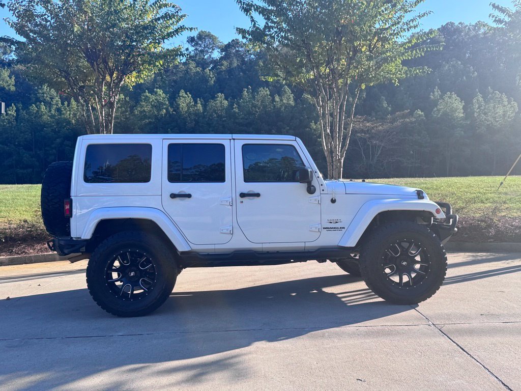Used 2016 Jeep Wrangler Unlimited Sahara with VIN 1C4HJWEG7GL184273 for sale in Stonewall, LA