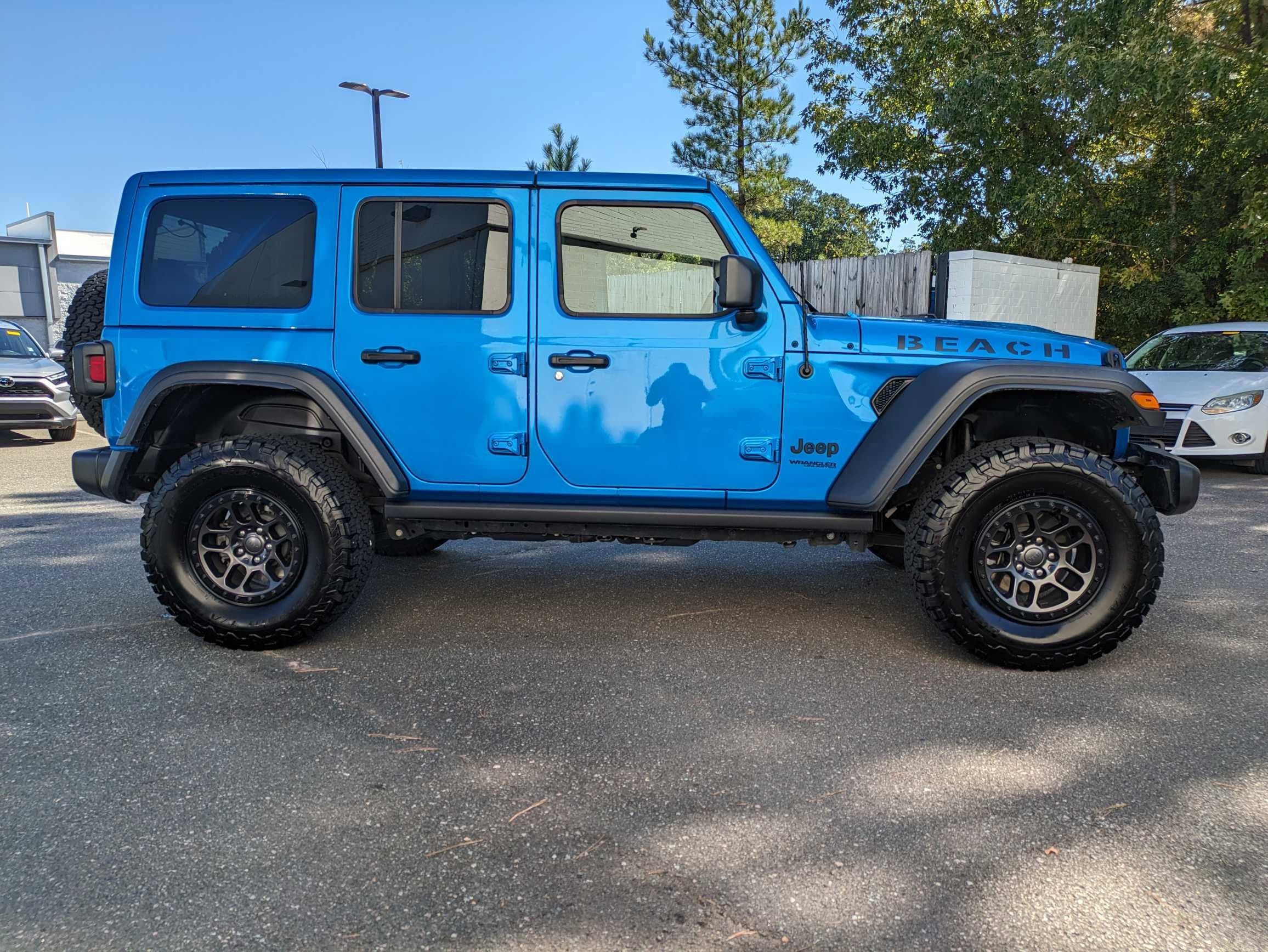 Used 2022 Jeep Wrangler Unlimited Sport with VIN 1C4HJXDG0NW203863 for sale in Lighthouse Point, FL