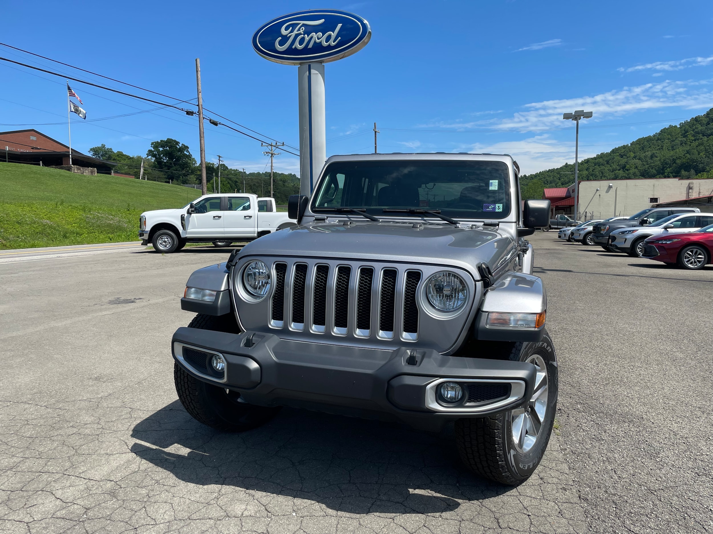 Used 2020 Jeep Wrangler Unlimited Sahara with VIN 1C4HJXEN7LW214286 for sale in Gassaway, WV