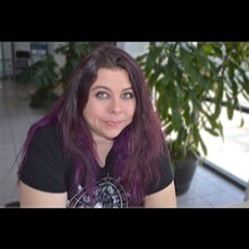 Staff member Sarah Poirier from ID_d7bfa9fd3cbf