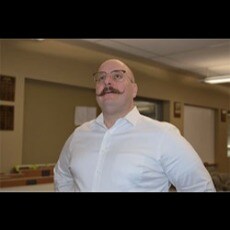 Staff member Greg Butcher from ID_5f3f18b19854