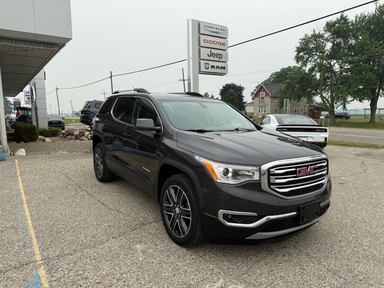 Used 2017 GMC Acadia SLE with VIN 1GKKNSLS0HZ233018 for sale in Marlette, MI
