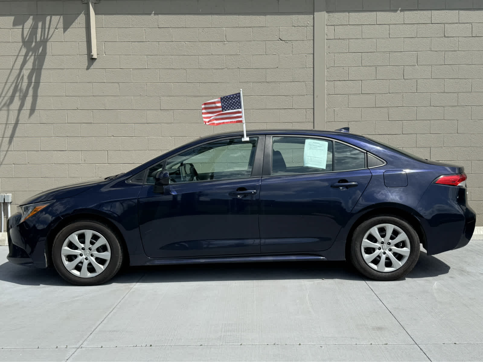 Used 2021 Toyota Corolla LE with VIN 5YFEPMAE7MP183234 for sale in Marlette, MI